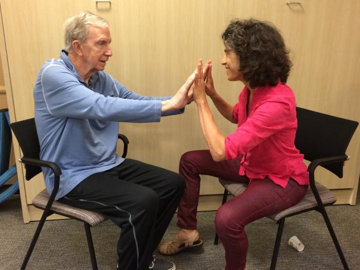 Maria Genné and a participant at Struthers Parkinson's Center at a Dancing Heart™ session. Photo courtesy of Kairos Alive!
